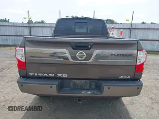2016 Nissan Titan SL z VIN 1N6BA1F48GN510113, wystawiony jako IAAI lot #42252271 z przebiegiem 58 691 mil mil oraz . Historia ofert i sprzedaży dostępna na DreamBid. Obrazek 16.