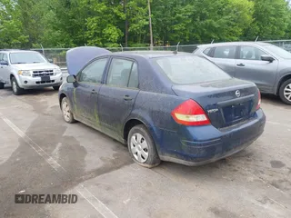 2010 Nissan Versa 1.6 with VIN 3N1CC1AP4AL358019, listed as a IAAI auction lot 42118051 with 179,163 mi miles. Bid and sale history available at carsss.com. Image 3.