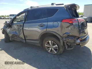 2018 Toyota RAV4 XLE with VIN JTMWFREV6JJ172451, listed as a Copart auction lot 58095775 with Not provided miles and Salvage title. Bid and sale history available at DreamBid. Image 2.