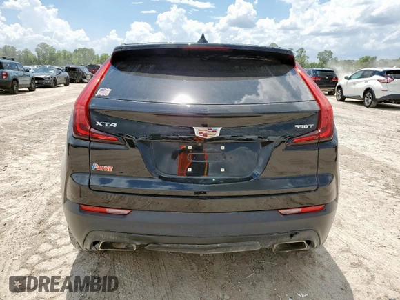 2023 Cadillac XT4 FWD Luxury with VIN 1GYAZAR46PF178003, listed as a Copart auction lot 59121545 with 42,000 mi miles and Salvage title. Bid and sale history available at DreamBid. Image 6.