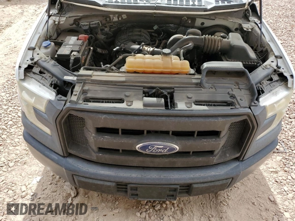 2015 Ford F-150 XL with VIN 1FTMF1C89FKD69802, listed as a Copart auction lot 47600995 with 107,896 mi miles and Salvage title. Bid and sale history available at DreamBid. Image 11.