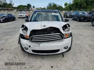 2013 MINI Countryman with VIN WMWZB3C5XDWM31715, listed as a Copart auction lot 57028565 with 95,453 mi miles and Salvage title. Bid and sale history available at DreamBid. Image 13.