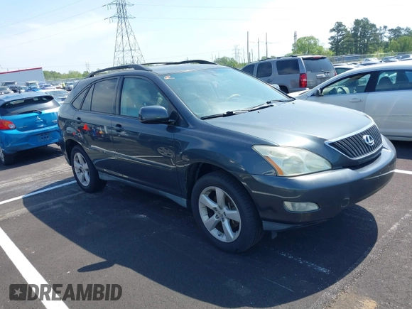 2007 Lexus RX with VIN 2T2GK31U07C021695, listed as a IAAI auction lot 42032252 with 146,023 mi miles. Bid and sale history available at carsss.com. Image 1.