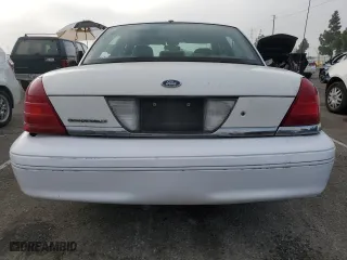 2005 Ford Crown Victoria LX with VIN 2FAFP74W95X124697, listed as a Copart auction lot 86931404 with 303,132 mi miles and Clean Title. Bid and sale history available at carsss.com. Image 6.