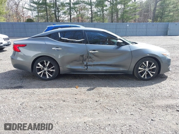 2017 Nissan Maxima SV z VIN 1N4AA6AP2HC443024, wystawiony jako IAAI lot #41792085 z przebiegiem 138 285 mil mil oraz . Historia ofert i sprzedaży dostępna na DreamBid. Obrazek 13.