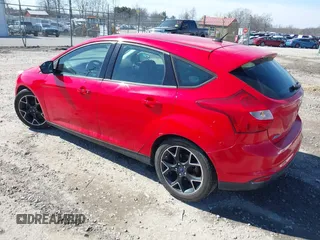2013 Ford Focus SE with VIN 1FADP3K28DL180271, listed as a IAAI auction lot 41709369 with 121,823 mi miles. Bid and sale history available at carsss.com. Image 3.