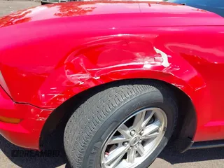 2007 Ford Mustang Deluxe z VIN 1ZVFT84N475282577, wystawiony jako IAAI lot #42239652 z przebiegiem 141 048 mil mil oraz . Historia ofert i sprzedaży dostępna na DreamBid. Obrazek 6.