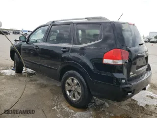 2009 Kia Borrego EX with VIN KNDJJ741295021249, listed as a Copart auction lot 82643094 with 209,580 mi miles and Salvage Title. Bid and sale history available at carsss.com. Image 2.