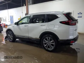 2021 Honda CR-V Touring z VIN 7FART6H97ME005163, wystawiony jako Copart lot #57688485 z przebiegiem 79 137 mil mil oraz Szkoda całkowita • Salvage title. Historia ofert i sprzedaży dostępna na DreamBid. Obrazek 2.