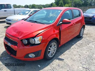 2012 Chevrolet Sonic LT with VIN 1G1JC6SH9C4128132, listed as a IAAI auction lot 42632261 with 160,029 mi miles and . Bid and sale history available at DreamBid. Image 2.