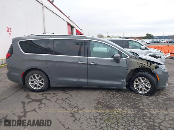 2021 Chrysler Pacifica Touring L with VIN 2C4RC1BG0MR543634, listed as a IAAI auction lot 41513467 with 148,010 mi miles and . Bid and sale history available at DreamBid. Image 13.