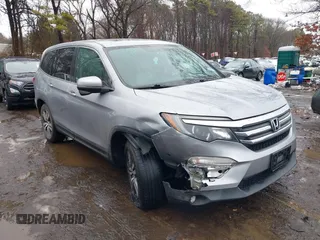 2017 Honda Pilot EX-L with VIN 5FNYF6H51HB069068, listed as a IAAI auction lot 41567728 with 100,618 mi miles and . Bid and sale history available at DreamBid. Image 13.