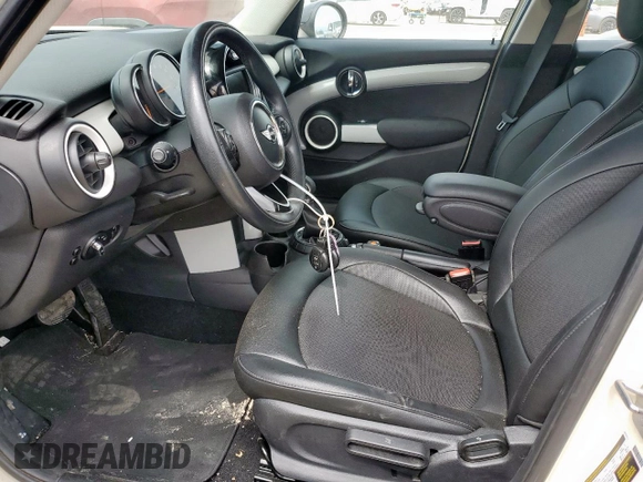 2015 MINI Hardtop 4 Door with VIN WMWXS5C51FT831167, listed as a Copart auction lot 52778685 with 52,770 mi miles and Salvage title. Bid and sale history available at DreamBid. Image 7.