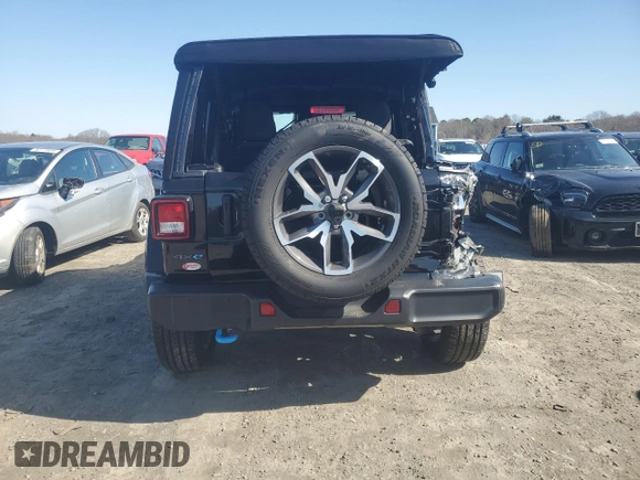 2024 Jeep Wrangler Willys с VIN 1C4RJXN62RW133671, выставлен на аукционе Copart как лот 52502545 с пробегом Не указан миль и Списание • Salvage title. История ставок и продаж доступна на DreamBid. Изображение 6.