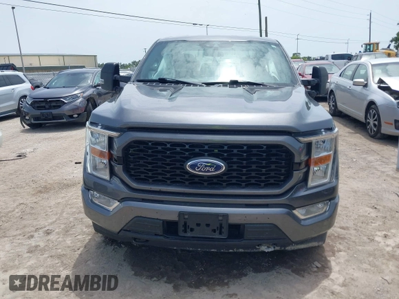 2021 Ford F-150 XL with VIN 1FTEW1EP6MFA07747, listed as a IAAI auction lot 42426426 with 73,586 mi miles and . Bid and sale history available at DreamBid. Image 12.