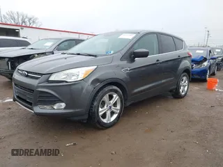2015 Ford Escape SE with VIN 1FMCU9G96FUB90684, listed as a IAAI auction lot 41832982 with 127,900 mi miles. Bid and sale history available at carsss.com. Image 2.