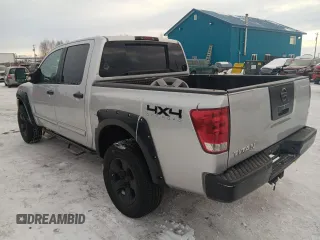 2005 Nissan Titan SE with VIN 1N6BA07B15N535701, listed as a Copart auction lot 46502565 with 180,923 mi miles and Salvage Title. Bid and sale history available at DreamBid. Image 2.