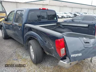 2016 Nissan Frontier SV z VIN 1N6AD0ER0GN766367, wystawiony jako IAAI lot #41840920 z przebiegiem 104 869 mil mil oraz . Historia ofert i sprzedaży dostępna na DreamBid. Obrazek 3.