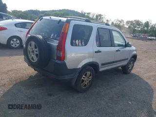 2004 Honda CR-V EX z VIN JHLRD78804C021839, wystawiony jako IAAI lot #42385120 z przebiegiem 304 306 mil mil oraz . Historia ofert i sprzedaży dostępna na DreamBid. Obrazek 4.