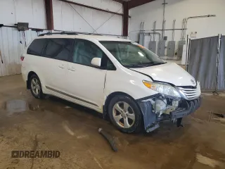 2016 Toyota Sienna LE AAS with VIN 5TDKK3DC6GS764404, listed as a Copart auction lot 63380615 with 123,221 mi miles and Salvage title. Bid and sale history available at DreamBid. Image 4.