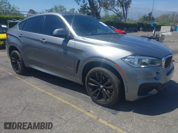 2018 BMW X6 xDrive35i z VIN 5UXKU2C51J0X50913, wystawiony jako IAAI lot #42078443 z przebiegiem Nie podano mil oraz . Historia ofert i sprzedaży dostępna na DreamBid. Obrazek 1.