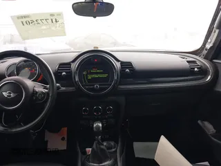 2016 MINI Clubman z VIN WMWLN5C56G2E30309, wystawiony jako IAAI lot #41772501 z przebiegiem 67 584 mil mil oraz . Historia ofert i sprzedaży dostępna na DreamBid. Obrazek 17.