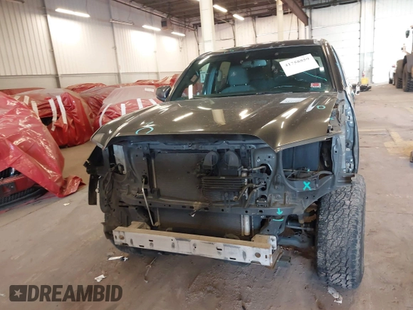 2016 Toyota Tacoma SR with VIN 3TMCZ5AN2GM041649, listed as a IAAI auction lot 41758859 with 139,558 mi miles and . Bid and sale history available at DreamBid. Image 13.