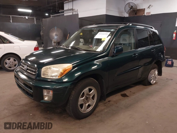 2003 Toyota RAV4 with VIN JTEGH20V130114281, listed as a IAAI auction lot 42144334 with 82,134 mi miles and . Bid and sale history available at carsss.com. Image 2.