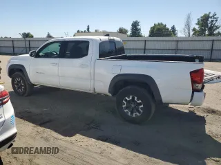 2017 Toyota Tacoma SR5 with VIN 3TMDZ5BN2HM027836, listed as a Copart auction lot 57299415 with 124,255 mi miles and Salvage title. Bid and sale history available at DreamBid. Image 2.