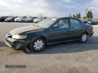 1998 Honda Accord LX z VIN 1HGCG5645WA150187, wystawiony jako Copart lot #65511215 z przebiegiem 183 036 mil mil oraz Szkoda całkowita • Salvage title. Historia ofert i sprzedaży dostępna na DreamBid. Obrazek 1.