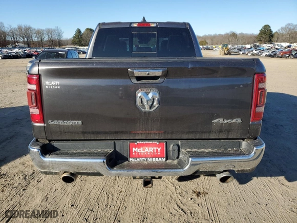 2021 Ram 1500 Laramie with VIN 1C6SRFJTXMN665384, listed as a Copart auction lot 42037685 with 76,836 mi miles and Salvage Title. Bid and sale history available at carsss.com. Image 6.