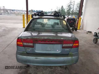 2002 Subaru Legacy L with VIN 4S3BE635326203291, listed as a IAAI auction lot 41338066 with 234,655 mi miles and . Bid and sale history available at DreamBid. Image 16.