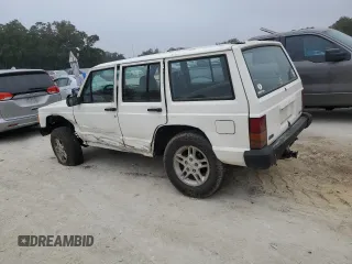 1996 Jeep Cherokee SE z VIN 1J4FJ28S7TL256478, wystawiony jako Copart lot #47164985 z przebiegiem 195 800 mil mil oraz Nie do naprawy • Non repairable. Historia ofert i sprzedaży dostępna na DreamBid. Obrazek 2.