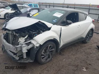 2021 Toyota C-HR LE with VIN NMTKHMBX4MR128066, listed as a IAAI auction lot 41102041 with 53,811 mi miles. Bid and sale history available at carsss.com. Image 2.