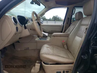 2006 Mercury Mountaineer Convenience with VIN 4M2EU36E96UJ01614, listed as a Copart auction lot 60242065 with 220,368 mi miles and Salvage title. Bid and sale history available at DreamBid. Image 7.
