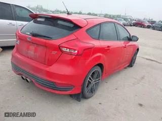 2015 Ford Focus ST with VIN 1FADP3L9XFL356641, listed as a IAAI auction lot 41928846 with 92,110 mi miles. Bid and sale history available at carsss.com. Image 4.