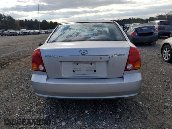 2005 Hyundai Accent GLS with VIN KMHCG45C05U618580, listed as a Copart auction lot 79239064 with 54,228 mi miles and Salvage Title. Bid and sale history available at carsss.com. Image 6.