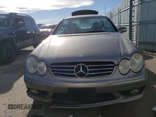 2005 Mercedes-Benz CLK 500 z VIN WDBTJ75J05F159477, wystawiony jako Copart lot #85168664 z przebiegiem 122 295 mil mil oraz Szkody całkowita. Historia ofert i sprzedaży dostępna na DreamBid. Obrazek 5.