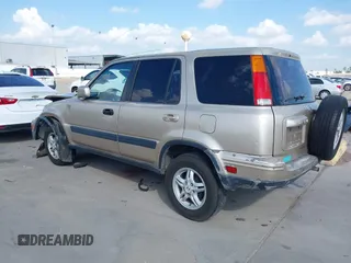 2000 Honda CR-V SE with VIN JHLRD1873YC039813, listed as a IAAI auction lot 40716079 with 214,067 mi miles. Bid and sale history available at carsss.com. Image 3.
