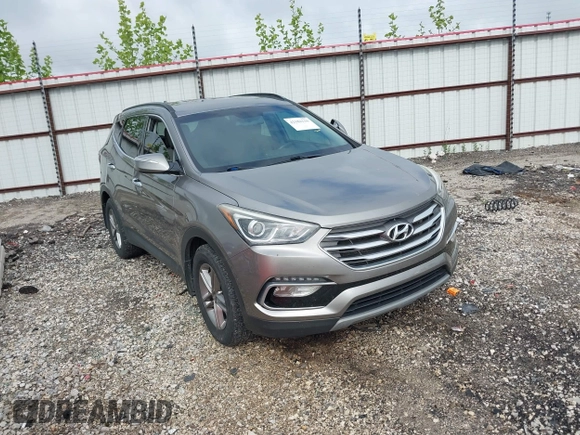 2018 Hyundai Santa Fe 2.4L with VIN 5NMZU3LB1JH100507, listed as a IAAI auction lot 42182116 with 103,826 mi miles and . Bid and sale history available at DreamBid. Image 1.