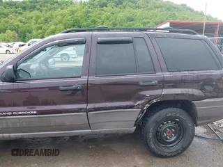 2004 Jeep Grand Cherokee Laredo z VIN 1J4GW48S94C209326, wystawiony jako IAAI lot #42309565 z przebiegiem 159 429 mil mil oraz . Historia ofert i sprzedaży dostępna na DreamBid. Obrazek 6.