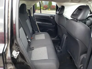 2009 Jeep Patriot Sport z VIN 1J4FF28B19D107312, wystawiony jako Copart lot #52885605 z przebiegiem 149 985 mil mil oraz Nie do naprawy • Non repairable. Historia ofert i sprzedaży dostępna na DreamBid. Obrazek 11.