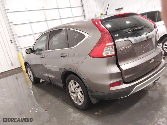 2015 Honda CR-V EX with VIN 3CZRM3H54FG712264, listed as a IAAI auction lot 41619854 with 119,077 mi miles. Bid and sale history available at carsss.com. Image 14.