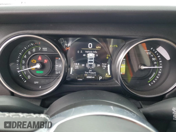 2023 Jeep Wrangler Sahara with VIN 1C4JJXP63PW536694, listed as a Copart auction lot 63409845 with 32,560 mi miles and Salvage title. Bid and sale history available at DreamBid. Image 9.
