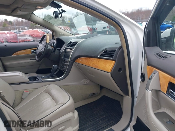 2012 Lincoln MKX with VIN 2LMDJ8JK2CBL04091, listed as a IAAI auction lot 42000831 with 164,711 mi miles and . Bid and sale history available at DreamBid. Image 5.