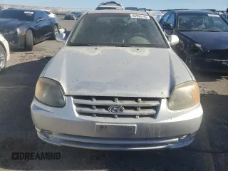 2003 Hyundai Accent GL with VIN KMHCG35C73U263320, listed as a Copart auction lot 88956145 with 191,208 mi miles and Salvage Title. Bid and sale history available at carsss.com. Image 5.