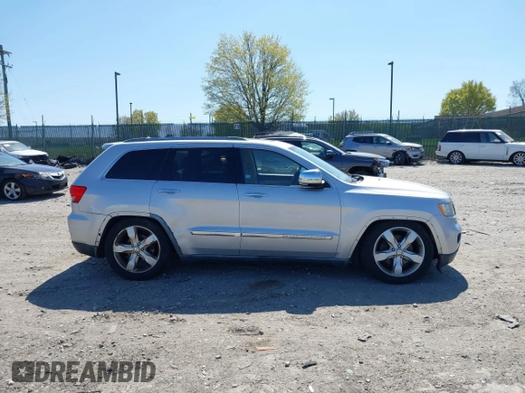 2011 Jeep Grand Cherokee Overland z VIN 1J4RR6GT6BC568491, wystawiony jako IAAI lot #42035464 z przebiegiem 147 389 mil mil oraz . Historia ofert i sprzedaży dostępna na DreamBid. Obrazek 13.