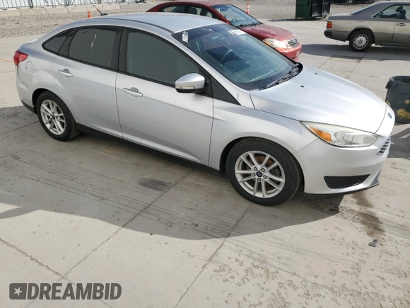 2016 Ford Focus SE with VIN 1FADP3F28GL270003, listed as a Copart auction lot 51852715 with 157,665 mi miles and Salvage Title. Bid and sale history available at DreamBid. Image 4.