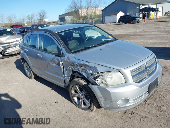 2012 Dodge Caliber SXT with VIN 1C3CDWDAXCD508338, listed as a IAAI auction lot 42091675 with 213,596 mi miles and . Bid and sale history available at DreamBid. Image 1.