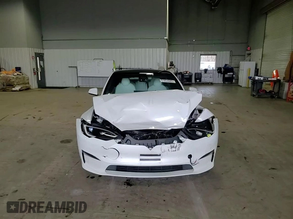 2023 Tesla Model S с VIN 5YJSA1E5XPF500758, выставлен на аукционе Copart как лот 51654685 с пробегом 25 390 миль миль и Списание • Salvage title. История ставок и продаж доступна на DreamBid. Изображение 10.